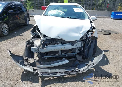 2014 Toyota Prius C Two from USA, damaged, VIN JTDKDTB34E1060001